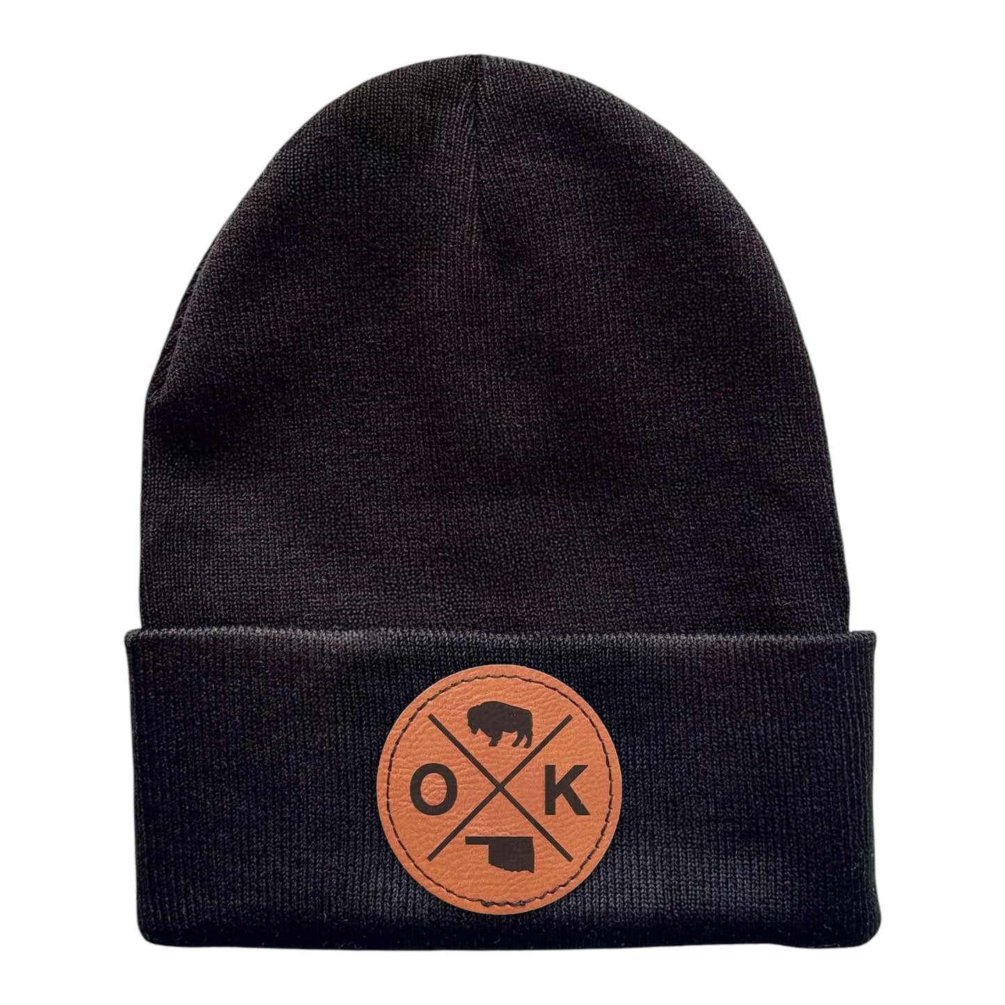 Black OK X beanie with a faux leather patch featuring the OK X design including a bison and the state of Oklahoma.