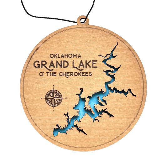 Round wooden ornament of Grand Lake O’ the Cherokees in Oklahoma, featuring a laser-cut map with blue lake details and compass design