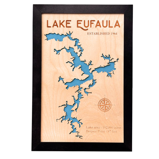 Wooden map of Lake Eufaula with intricate laser-cut design, blue lake inlay, compass engraving, and lake details