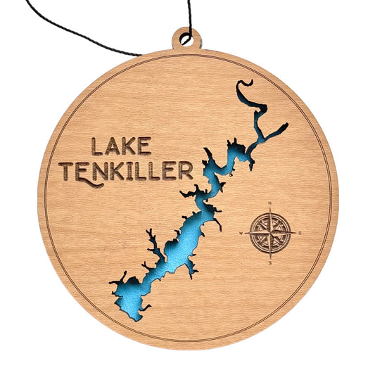 Round wooden ornament featuring a laser-cut map of Lake Tenkiller with blue water inlay and compass engraving