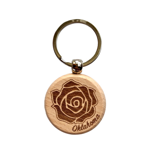 Wooden keychain featuring the Oklahoma rose design laser-engraved on durable maple with “Oklahoma” elegantly etched below.