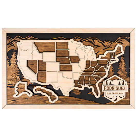 Personalized USA travel map featuring “Rodriguez” with wooden state pieces and a mountain design background.